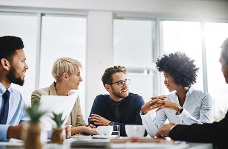 Coworkers having a meetings in a conference room